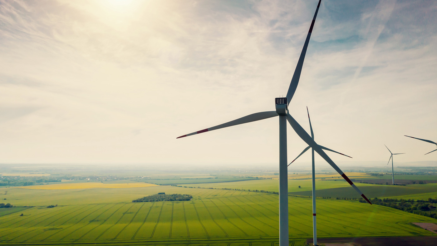 Aerial view of wind turbines and agriculture field Sustainable Resources Stock Photo
